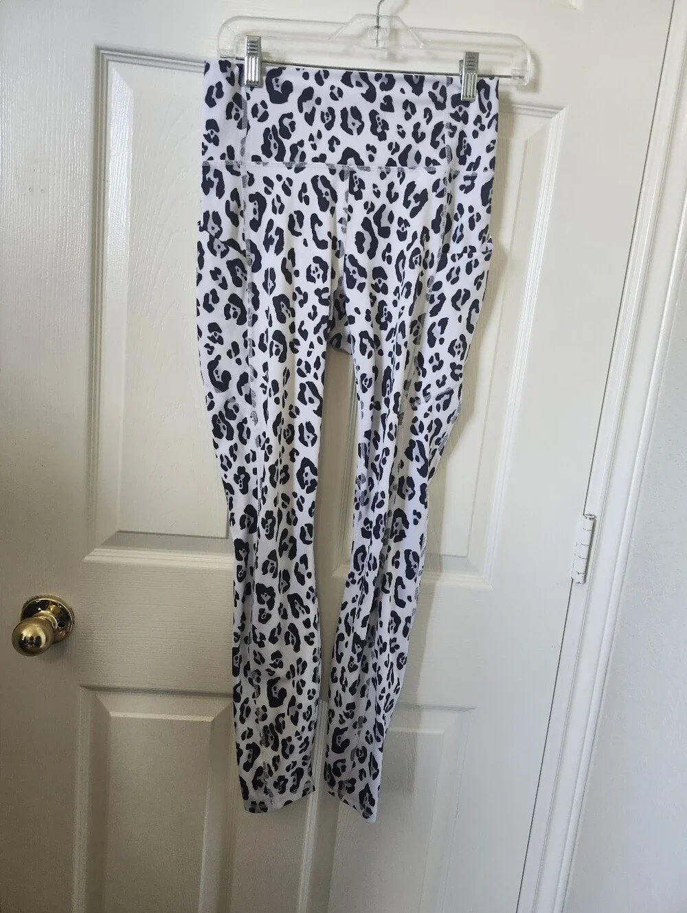 Fabletics Oasis White Leopard Print Leggings - Black Spot Pattern
